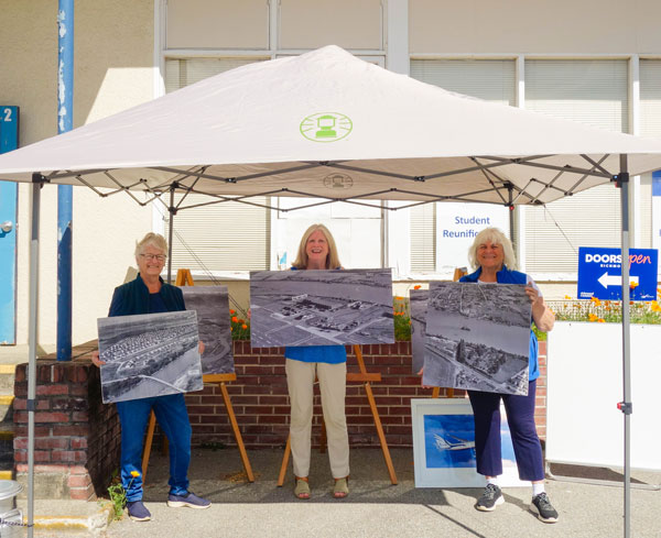 Barbara Nielsen, Marylin Low and Eunice Robinson holding signs, Doors Open Richmond 2024