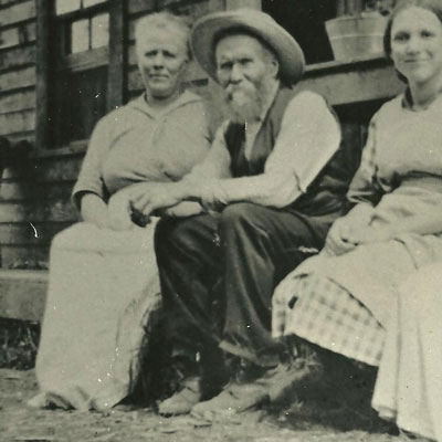 John and Mary Dinsmore sitting on a bench, pioneer