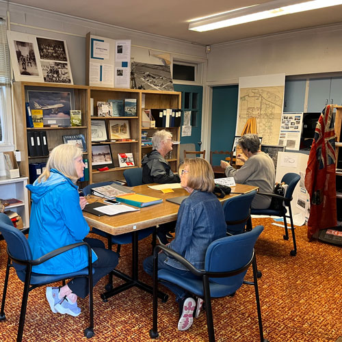 Sea Island Heritage Society locale with books, flag and furniture