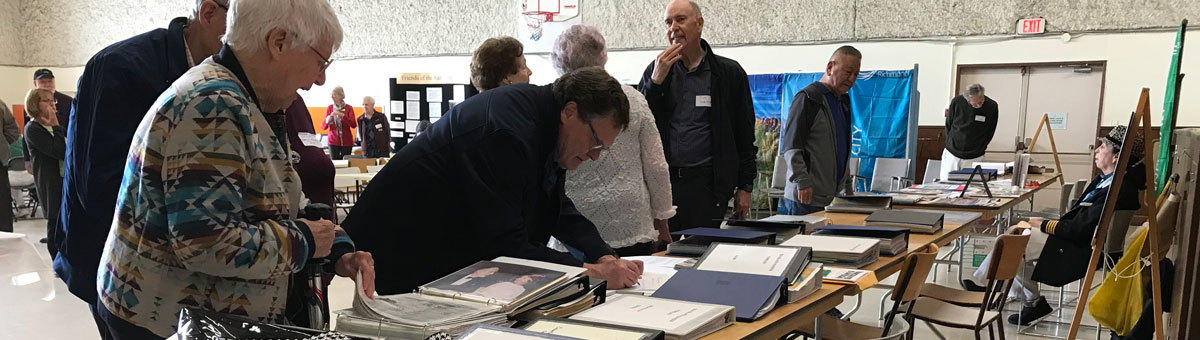 Pioneers display table at Sea Island reunion 2022.